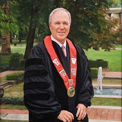 commissioned portrait of an older gentleman in black academic regalia.