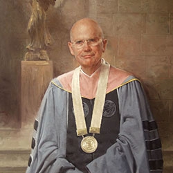 commissioned portrait of man in full academic regalia, with statue behind. 